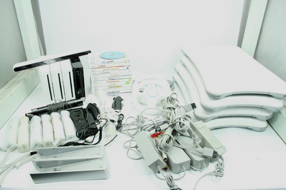 Lot of 4 Wii Game Consoles (View Details)3 white1 black Model # RVL-101/ RVL-001